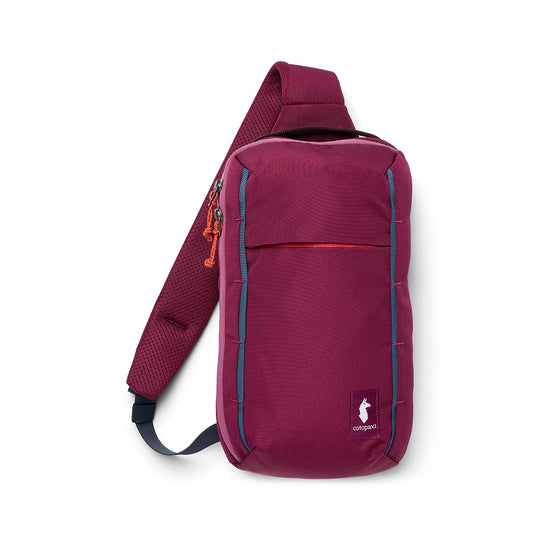 Purple sling bag with a visible brand logo on a white background