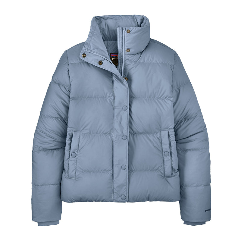Blue puffer jacket on a white background