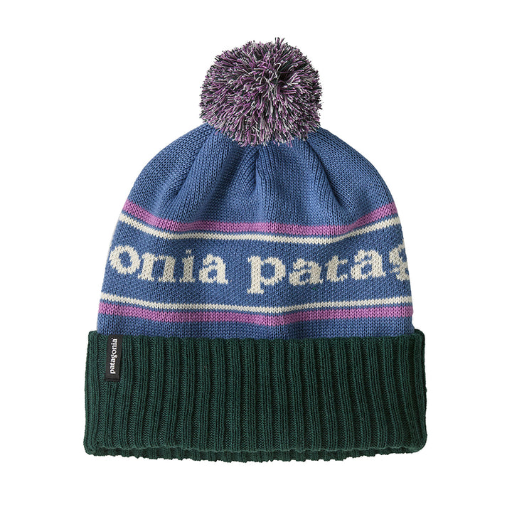 Knitted beanie with pom-pom and 'Patagonia' branding on a white background