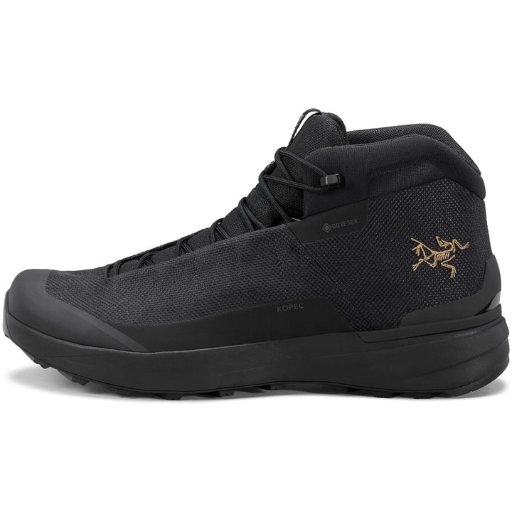 Black hiking boot with brand logo on a white background