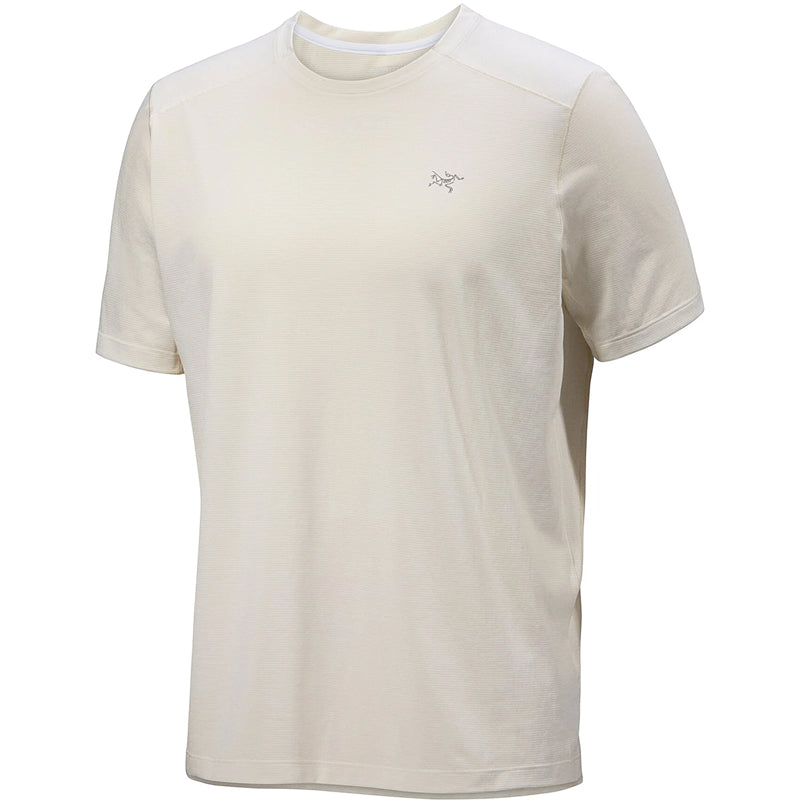 A short-sleeve crewneck athletic t-shirt in off-white/cream, featuring a small Arc'teryx logo on the left chest, displayed on a clean white background.
