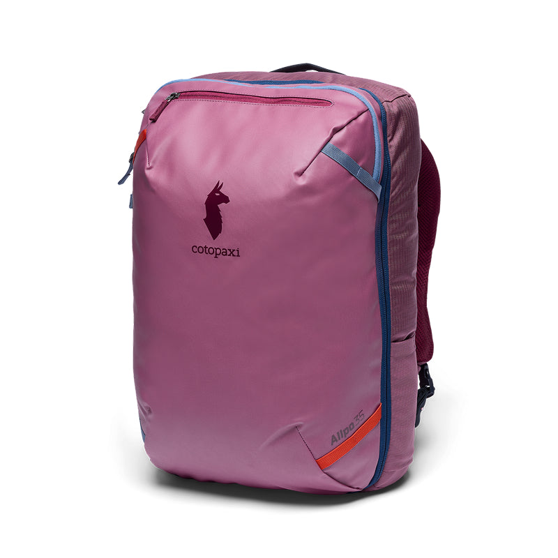 Pink backpack with blue accents and a visible brand logo on a white background
