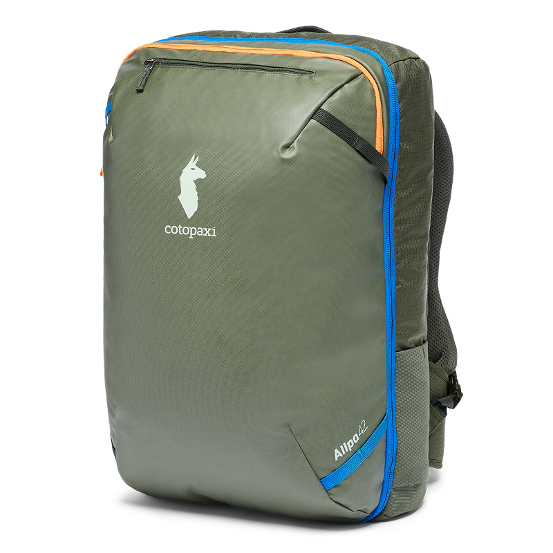 Green backpack with blue accents and Cotopaxi logo on a white background