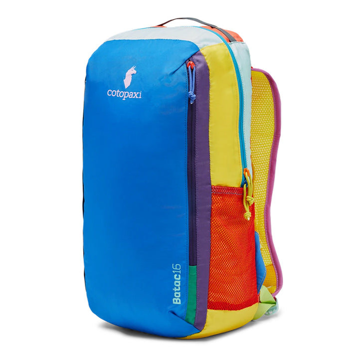 Colorful backpack with multiple compartments on a white background