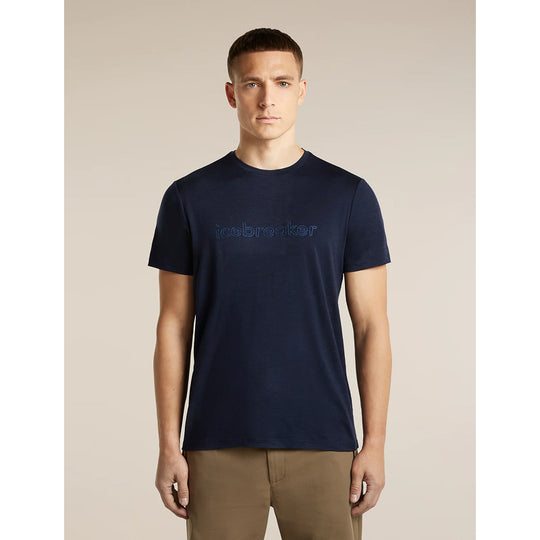 A man wearing a navy blue crewneck t-shirt with &