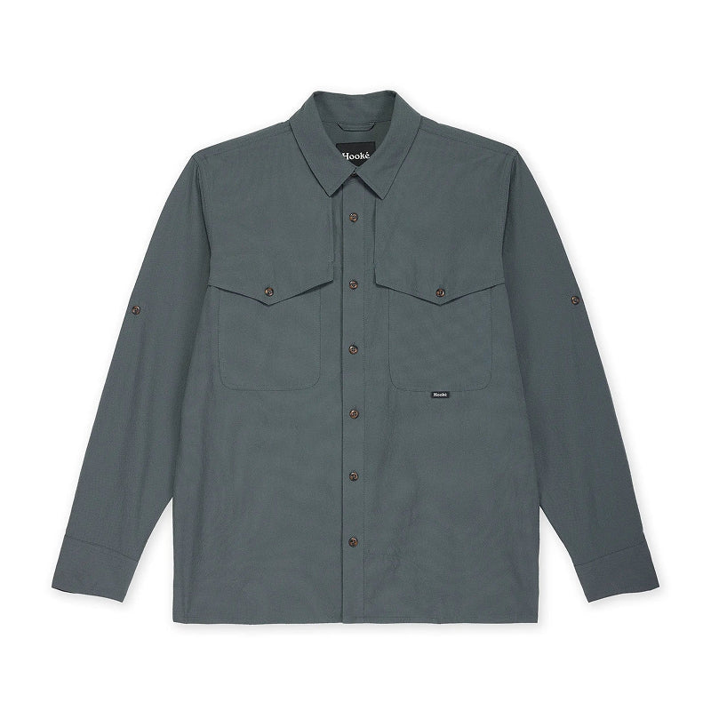 Green shirt with button details on a white background