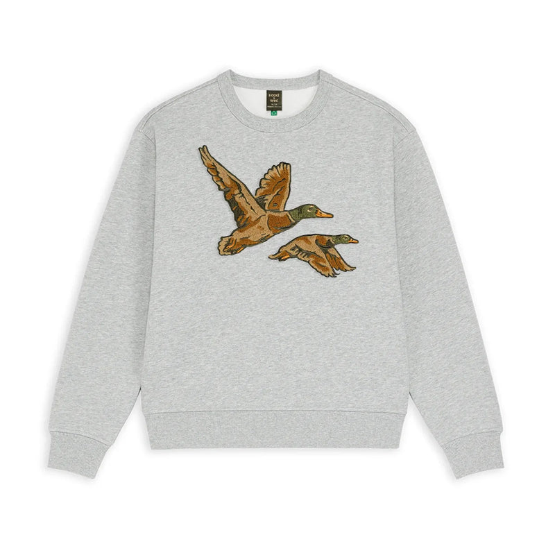 A light heather gray crewneck sweatshirt featuring a graphic print of two flying mallards on the chest, displayed against a solid white background.