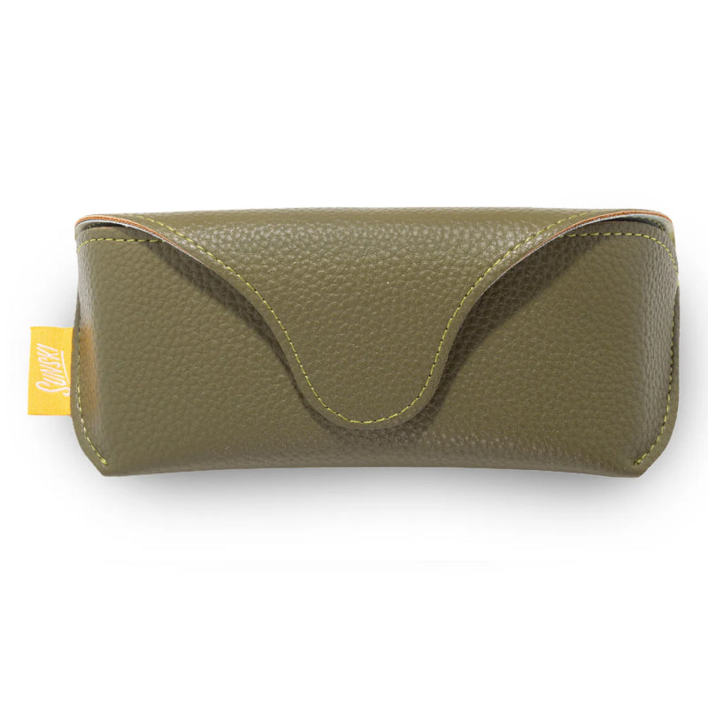 Green leather sunglasses case with a yellow tag on a white background